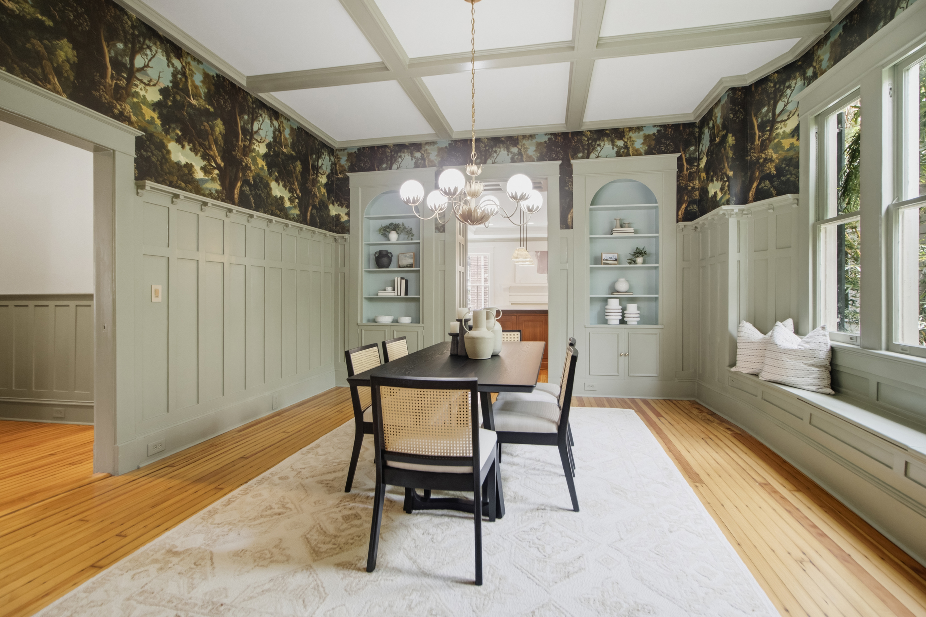 Paneled dining room with coffered ceiling