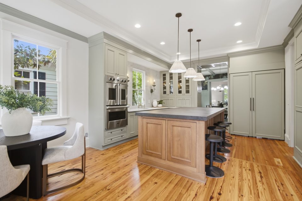 Foyer, staircase, and original millwork at 173 Tradd Street