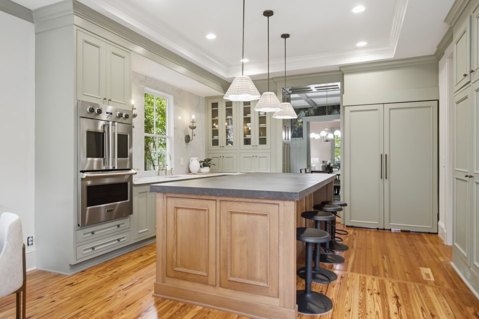 Foyer, staircase, and original millwork at 173 Tradd Street