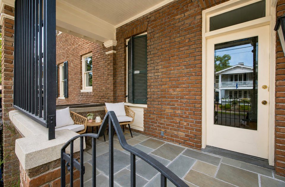 Private courtyard and porches at 173 Tradd Street